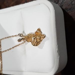 14 K yellow gold Nugget style pendant and Nugget style dangle earrings